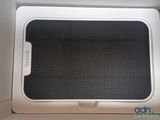 a close up of the inside of a white box with a black screen