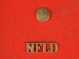 a picture of a red box with a silver coin and a red box with the words need is need