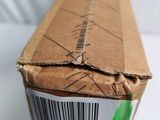 a brown box with a barcode on it sitting on a table