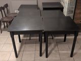 a table with two chairs and a table with two chairs
