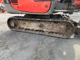 an image of a close up view of a small excavator
