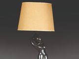 a lamp that is sitting on a table next to a lamp