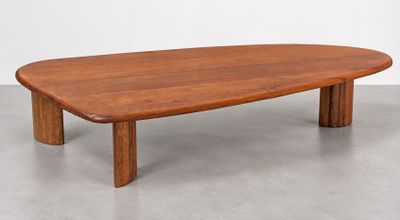an image of a wooden coffee table on a concrete floor