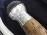 a hammer that is sitting on top of a bag