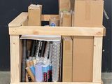 a carton with several boxes of supplies on top of it