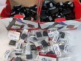 a box full of assorted electronic components on a table