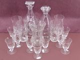a lot of glasses that are sitting on a table
