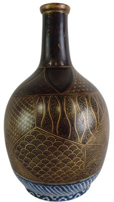 a vase with a design on it on a white background