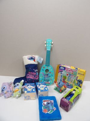 a lot of toys and a guitar on the table
