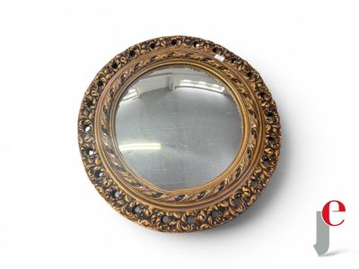 a mirror that is sitting on the wall