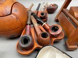 a lot of different types of pipes on the table