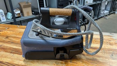 a machine that is sitting on top of a wooden table