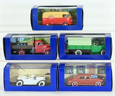 three boxes of toy cars are stacked on top of each other