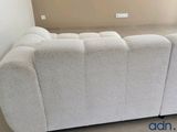 a couch that is sitting in the middle of a room