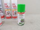 several sprays of different types of cleaning products on a table