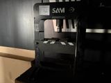 a machine that is sitting on a table in a room