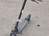 a scooter that is sitting on the ground