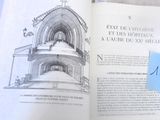 un livre ouvert sur lequel est dessiné une église