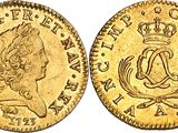 a gold sovereign coin with a crown on top of it