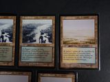 four cards of a game with a picture of a man and a woman