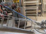 an image of a pile of tools in a garage