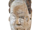 an image of a wooden mask with two ears on a white background