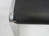 black leather and chrome dining chair with black seat and back