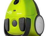 un gros plan d'un aspirateur vert sur fond blanc