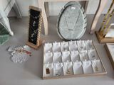 a display of jewelry on a table in a store