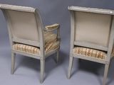 pair of louis xvi style armchairs with upholstered seats