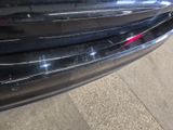 a close up of a car ' s front bumper