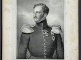 une vieille photo d'un homme en uniforme militaire, portant une moustache