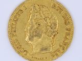 an image of a gold coin with a woman ' s head on it
