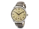 une image d'une montre-bracelet avec un bracelet en cuir marron