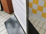an image of a menu board on a stand in a restaurant