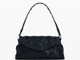 a black handbag with a handle and a strap