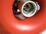 a red fire extinguisor attached to a white wall