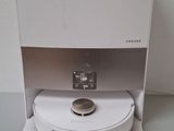 a small white machine that is sitting on a table