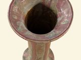 a vase that is sitting on a table