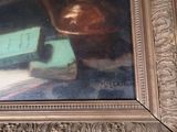 a picture of a painting of a vase on a table