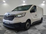 the white van is parked on a checkered floor in a room