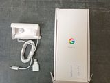 a box with a charger and a charger plugged into it