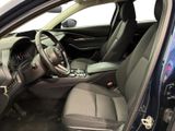 the interior of a car with a steering wheel and a dash board
