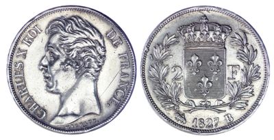 une pièce d'argent surmontée d'une couronne
