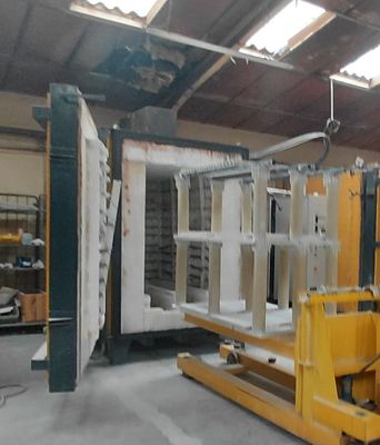 a picture of a warehouse with a forklift in the middle of the room