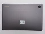the back of a samsung laptop with a sticker on it