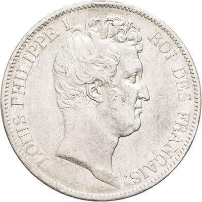 a close up of a coin with a woman ' s face on it