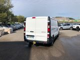 a white van that is parked in a parking lot