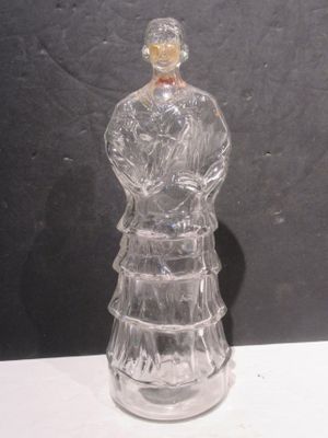 a glass figurine that is sitting on a table