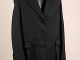 un manteau noir sur un mannequin mannequin mannequin mannequin mannequin mannequin mannequin mannequin mannequin mannequin
